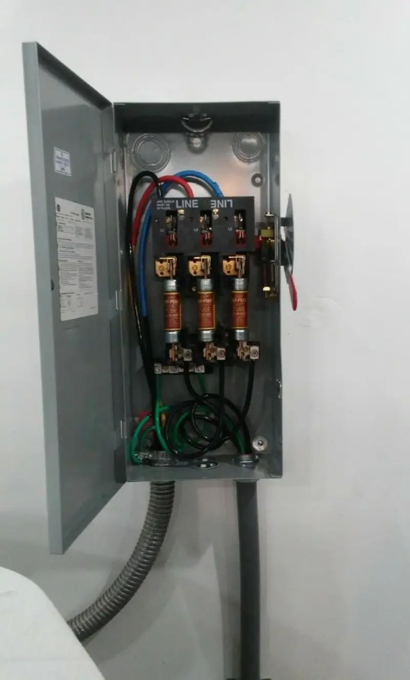 Three-phase disconnect switch installed for Smoke Detector Installation in Lake Royale